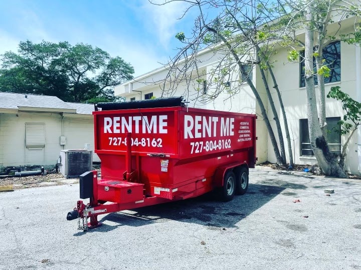 Dumpster Rental being dropped off at a commercial building or apartment in Bradenton FL